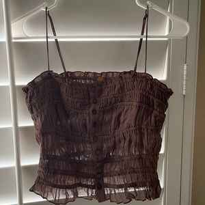 Free people brown tank top size small. Brand new and have not used.